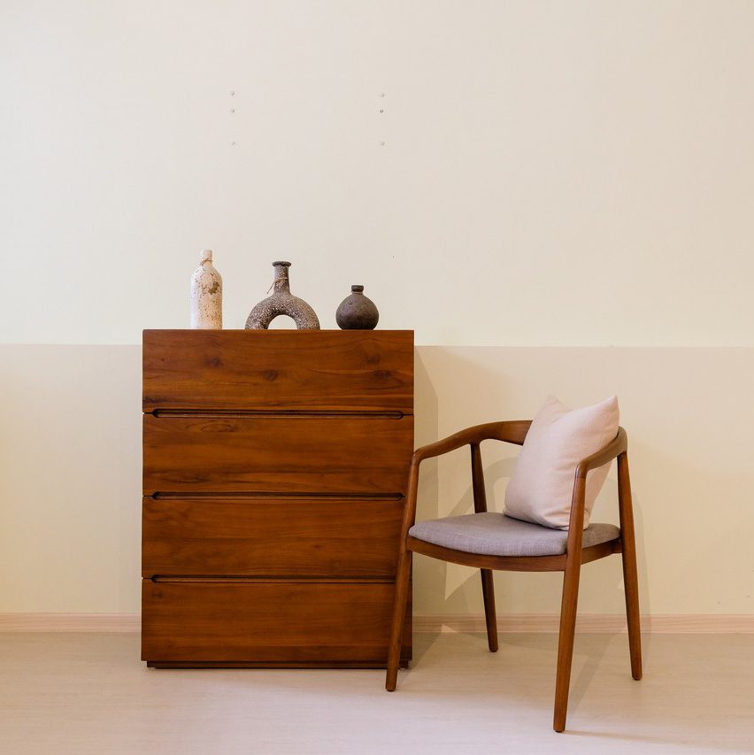 dark teakwood cabinet and chair