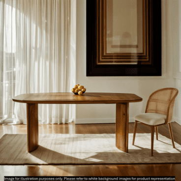 A wooden dining table decorated simply with a fruit bowl behind a large curtained window